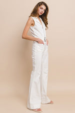 SLEEVELESS BELTED LONG FLARE DENIM JUMPSUIT - PRIVILEGE 