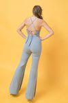 denim jumpsuit featuring halter neckline, flare pant - PRIVILEGE 