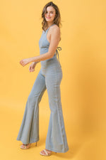 denim jumpsuit featuring halter neckline, flare pant - PRIVILEGE 